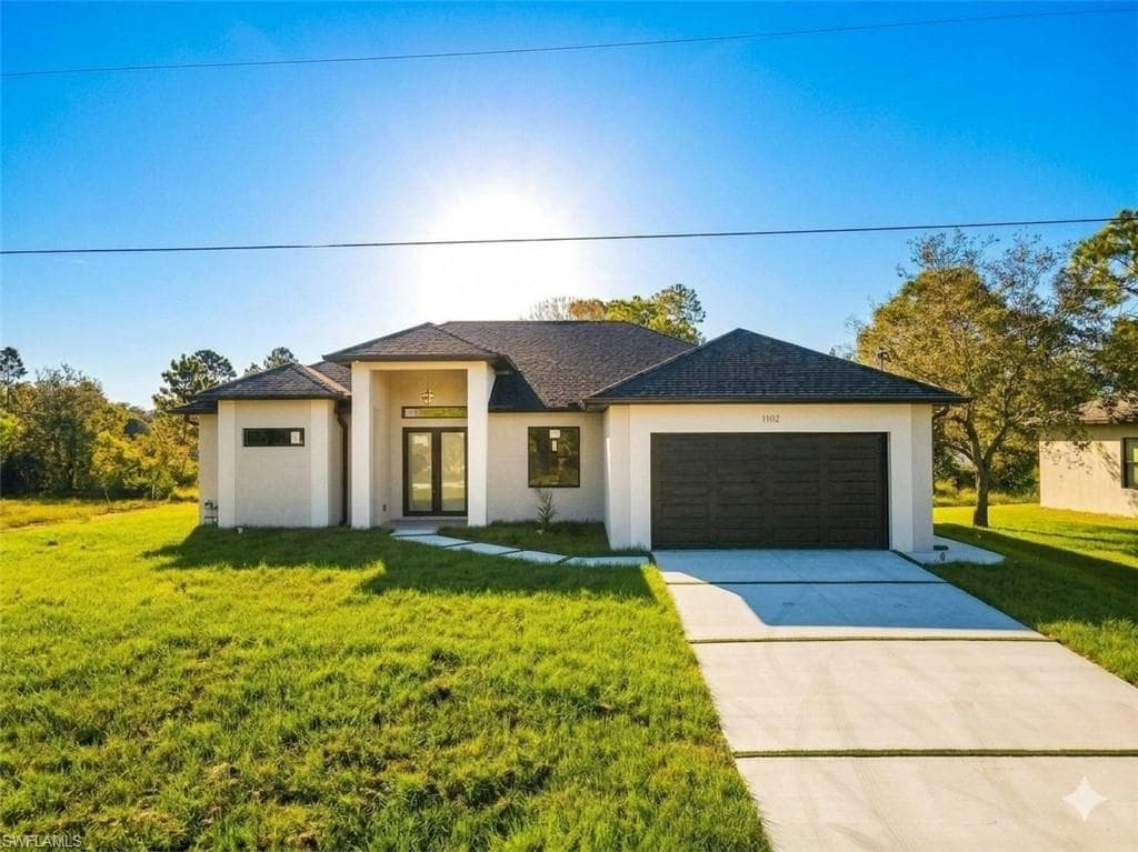 1102 Greenwood AVE LEHIGH ACRES, FL 33972
