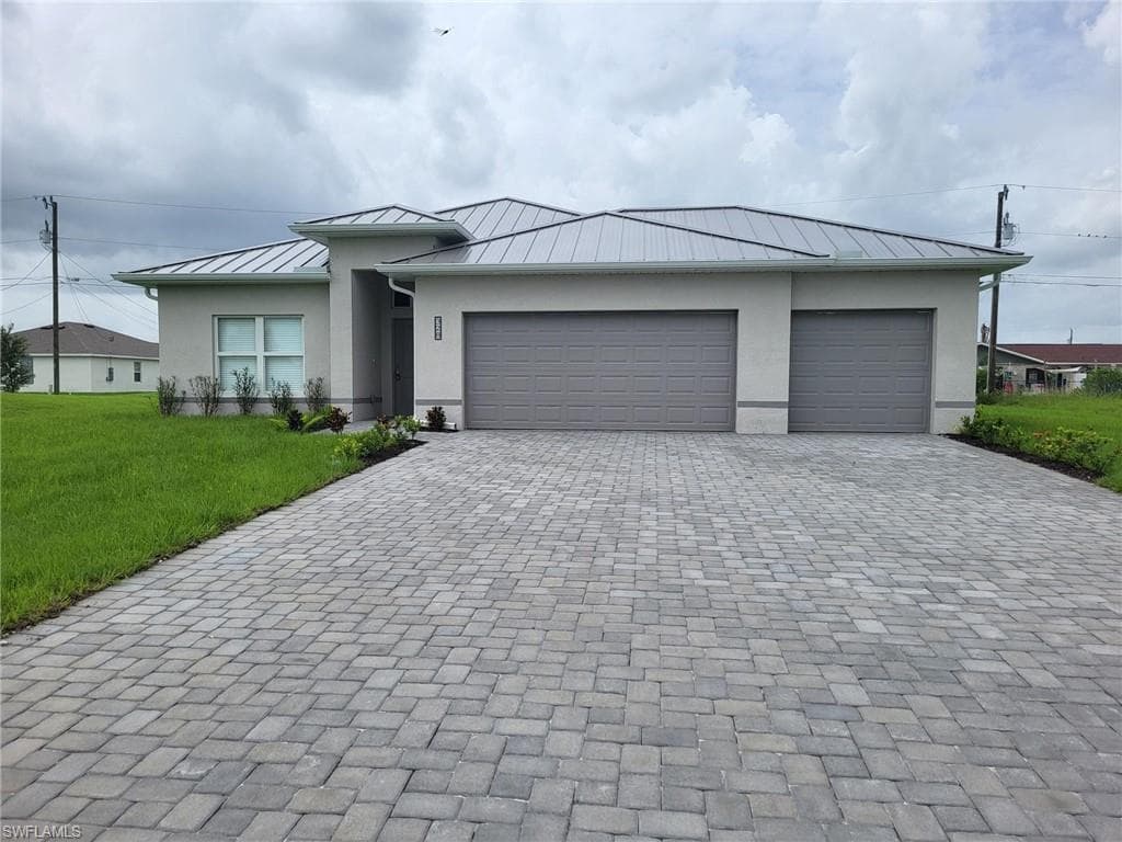328 NE 8th TER CAPE CORAL, FL 33993