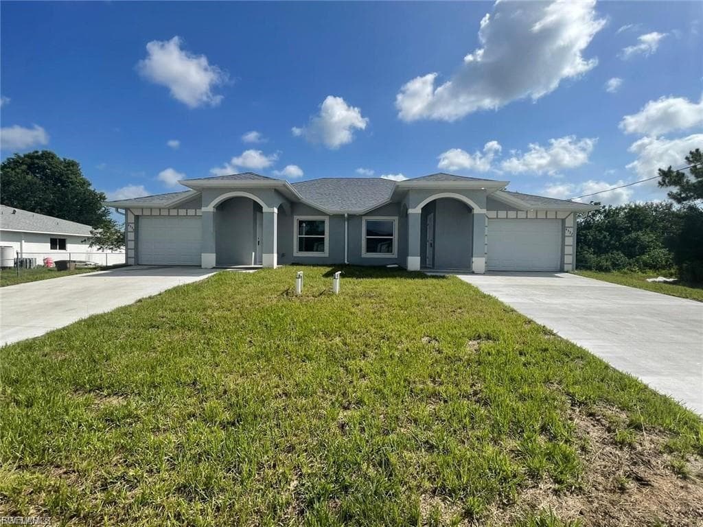 140/142 GILBERT AVE S LEHIGH ACRES, FL 33973