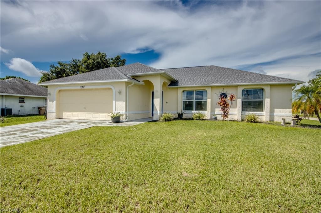 702 SW 11th AVE CAPE CORAL, FL 33991