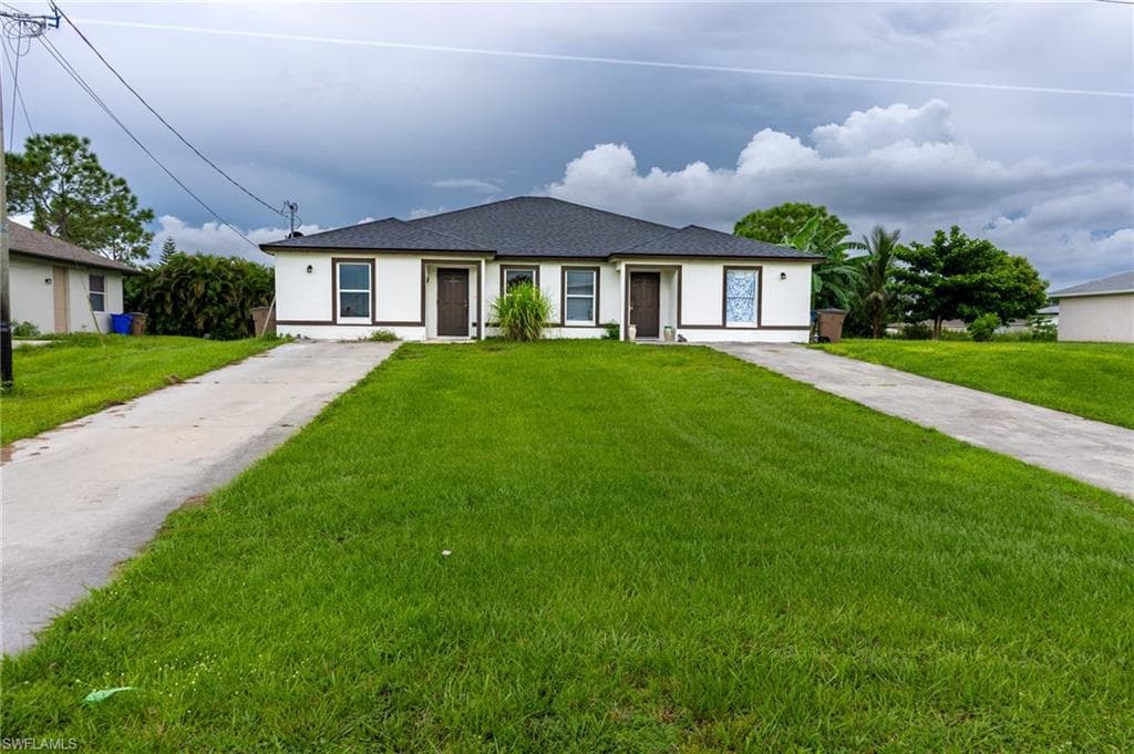 1033 Abrams BLVD LEHIGH ACRES, FL 33971