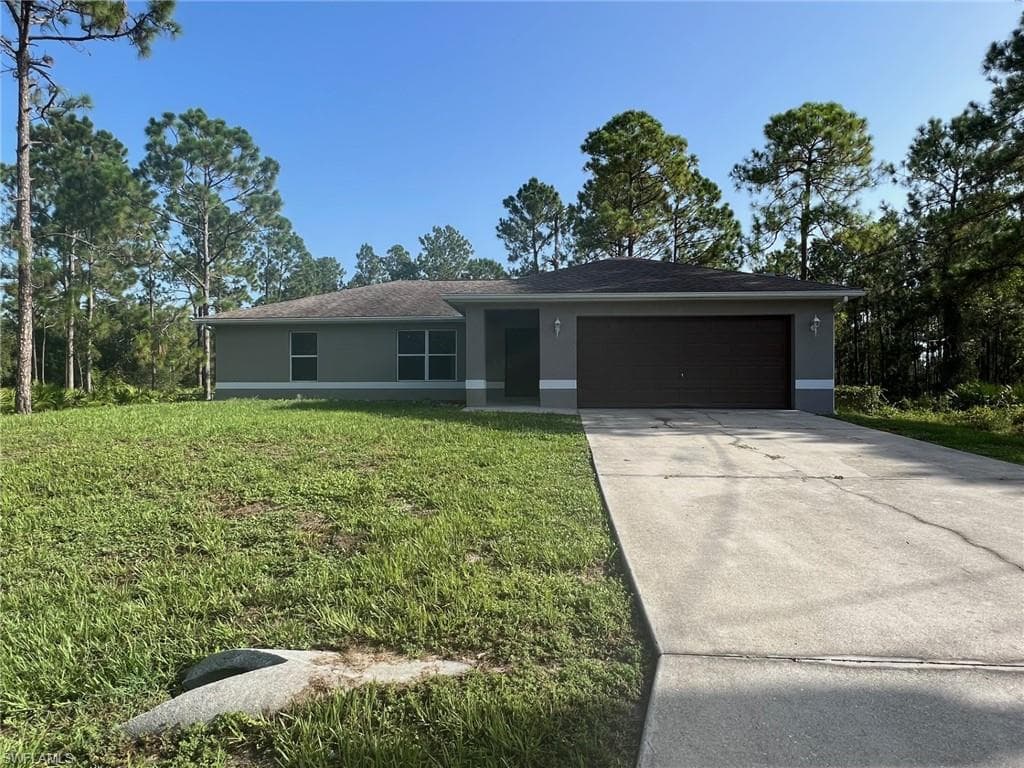 704 W 17th ST LEHIGH ACRES, FL 33972