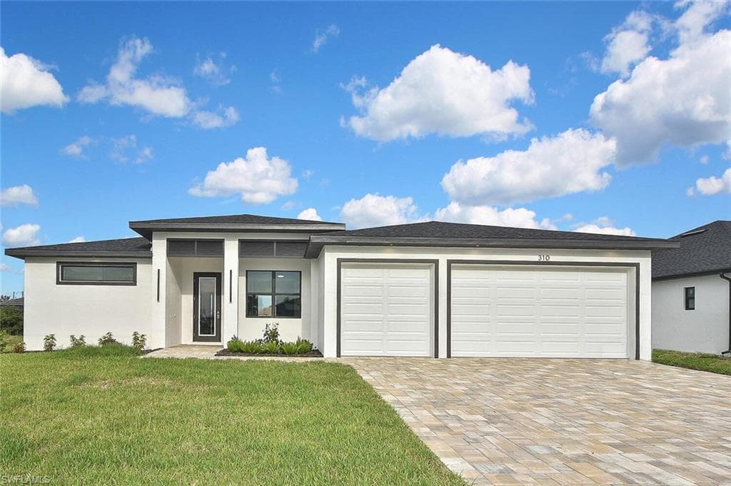 310 SW 26th AVE CAPE CORAL, FL 33991