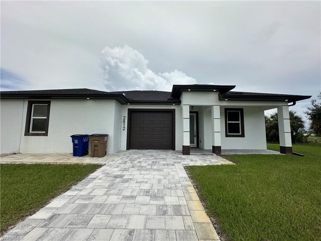 2414 Delta AVE N 2412 LEHIGH ACRES, FL 33971