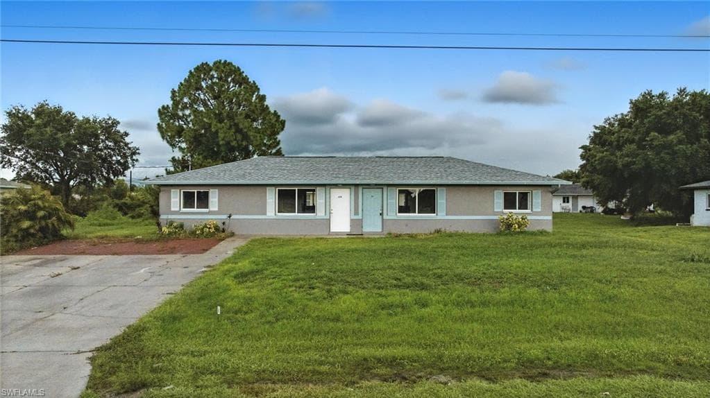 125/127 Gordon AVE S LEHIGH ACRES, FL 33973