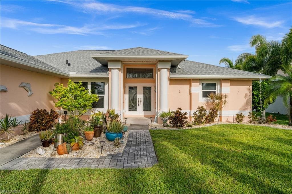 907 NW 38th PL CAPE CORAL, FL 33993