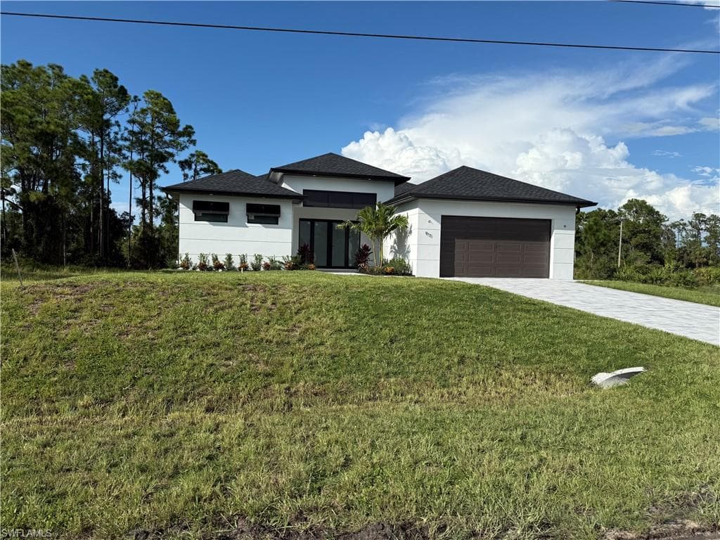 911 Asher ST E LEHIGH ACRES, FL 33974