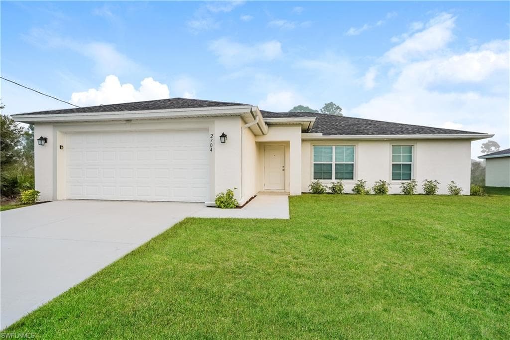 2704 23rd ST W LEHIGH ACRES, FL 33971