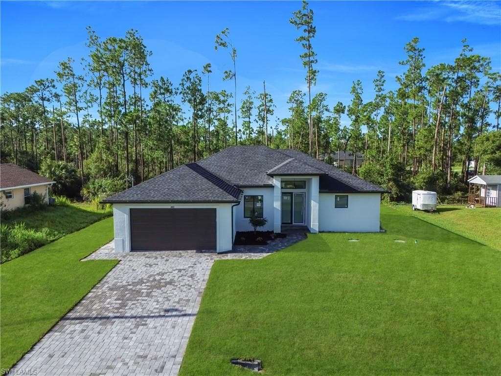 4002 E 9TH ST LEHIGH ACRES, FL 33972