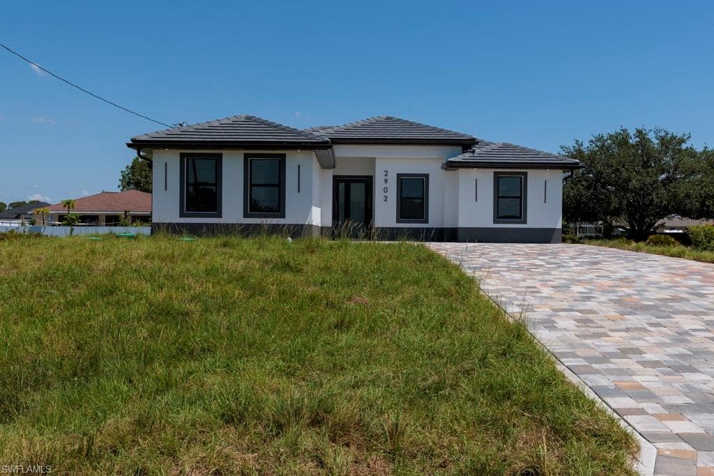 3218 4TH ST SW LEHIGH ACRES, FL 33976