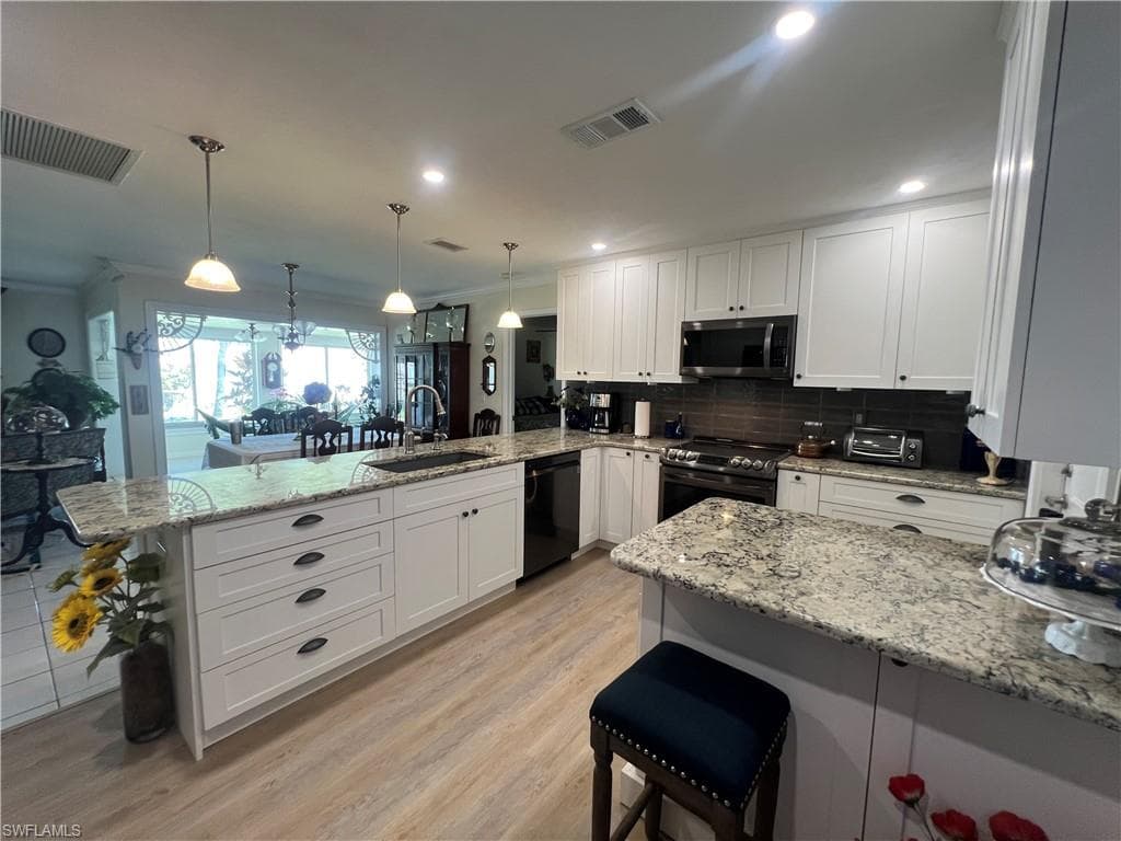 911 SE 18th TER CAPE CORAL, FL 33990