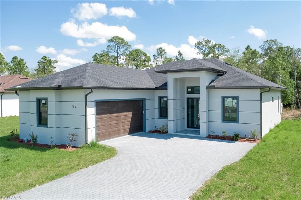 702 Richmond AVE N LEHIGH ACRES, FL 33972