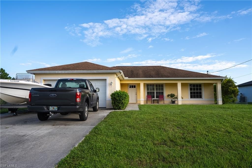2516 13th ST SW LEHIGH ACRES, FL 33976