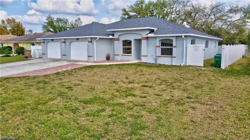 113/115 NE 16th PL CAPE CORAL, FL 33909