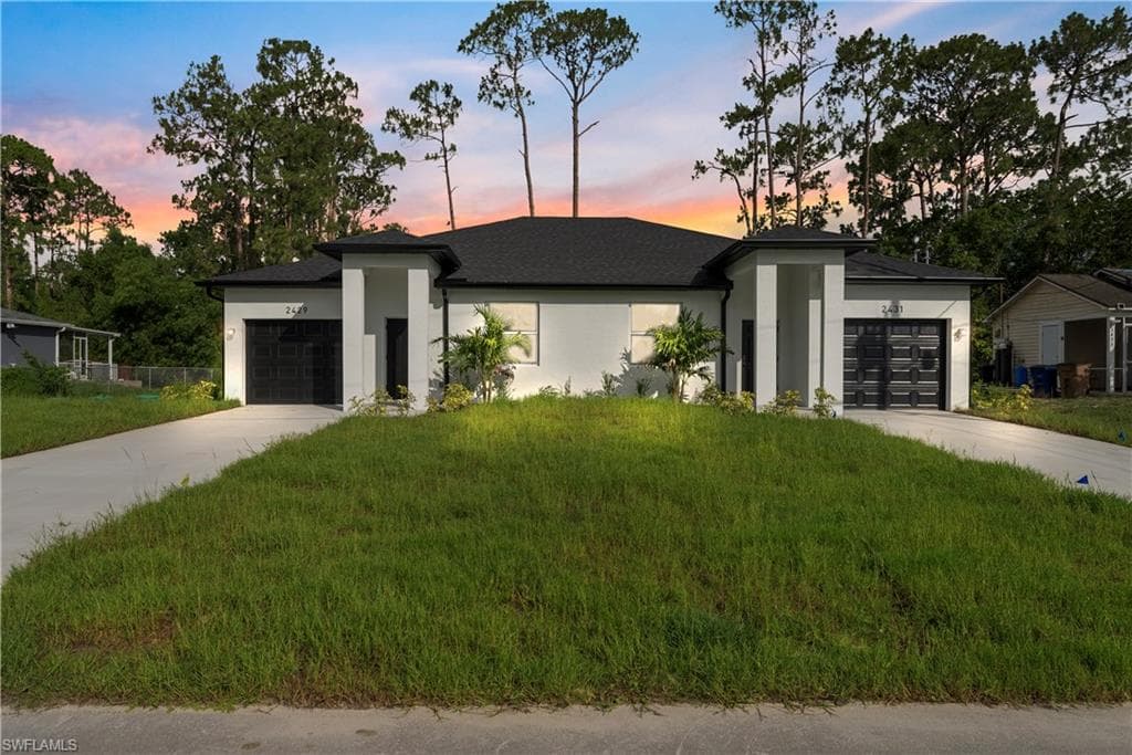 2429/2431 Lola AVE S LEHIGH ACRES, FL 33973