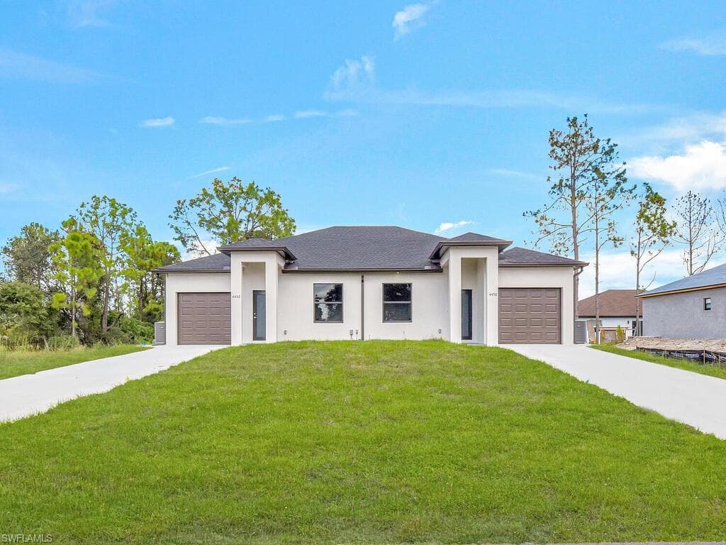 4450/4452 24th ST SW LEHIGH ACRES, FL 33973