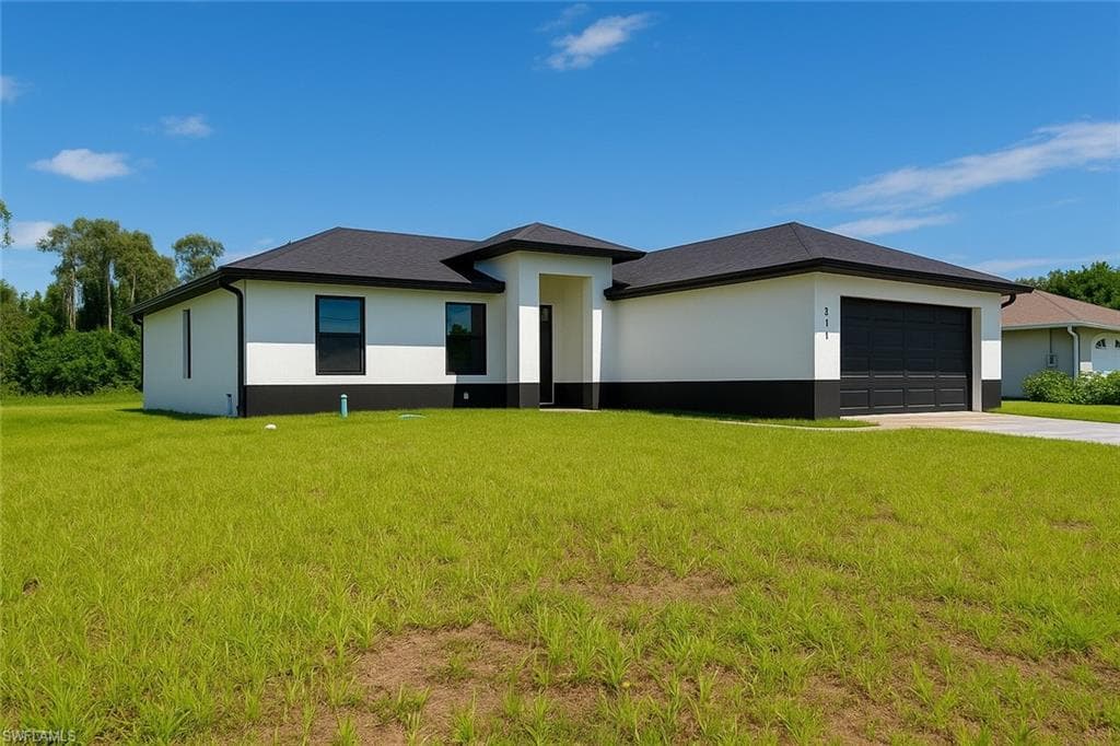 311 Ranier AVE LEHIGH ACRES, FL 33974