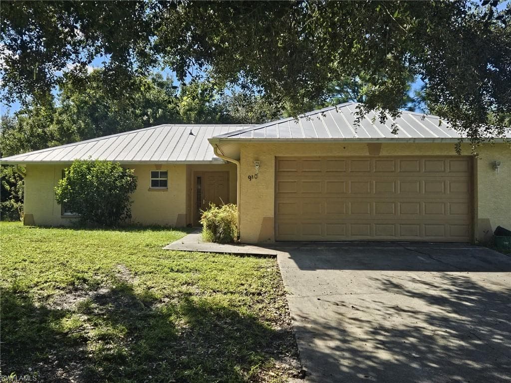 910 Naples AVE S LEHIGH ACRES, FL 33974