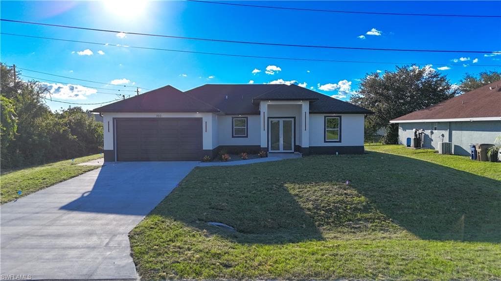 703 Otto AVE N LEHIGH ACRES, FL 33971