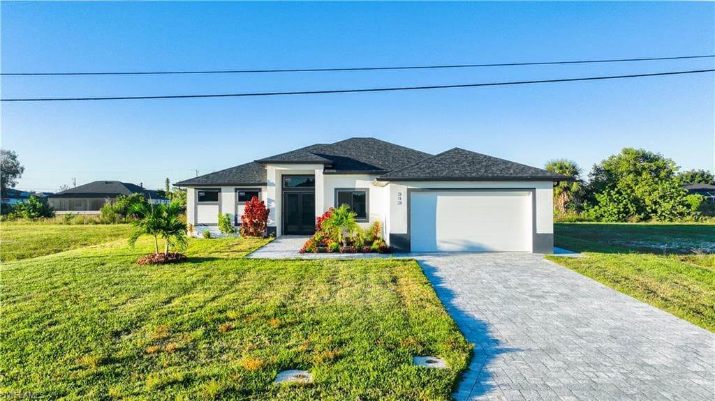 313 NE 5th TER CAPE CORAL, FL 33909