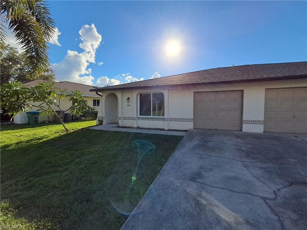 1238 SE 24th AVE CAPE CORAL, FL 33990