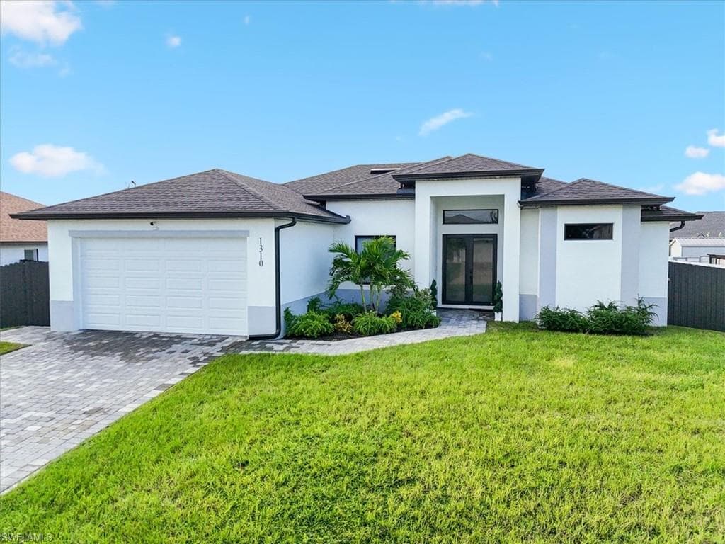 1310 NW 10th TER CAPE CORAL, FL 33993