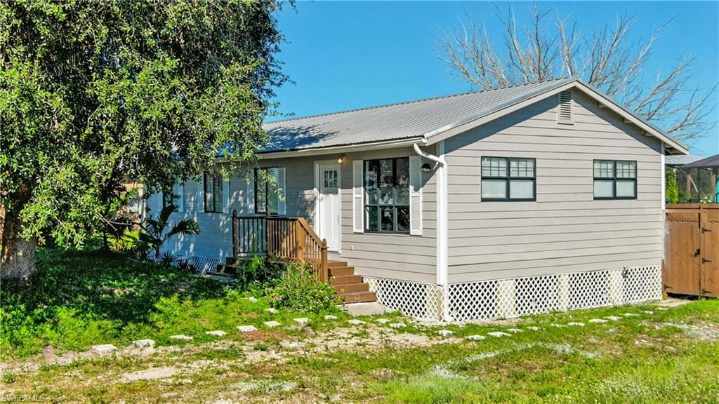3216 22ND ST SW LEHIGH ACRES, FL 33976