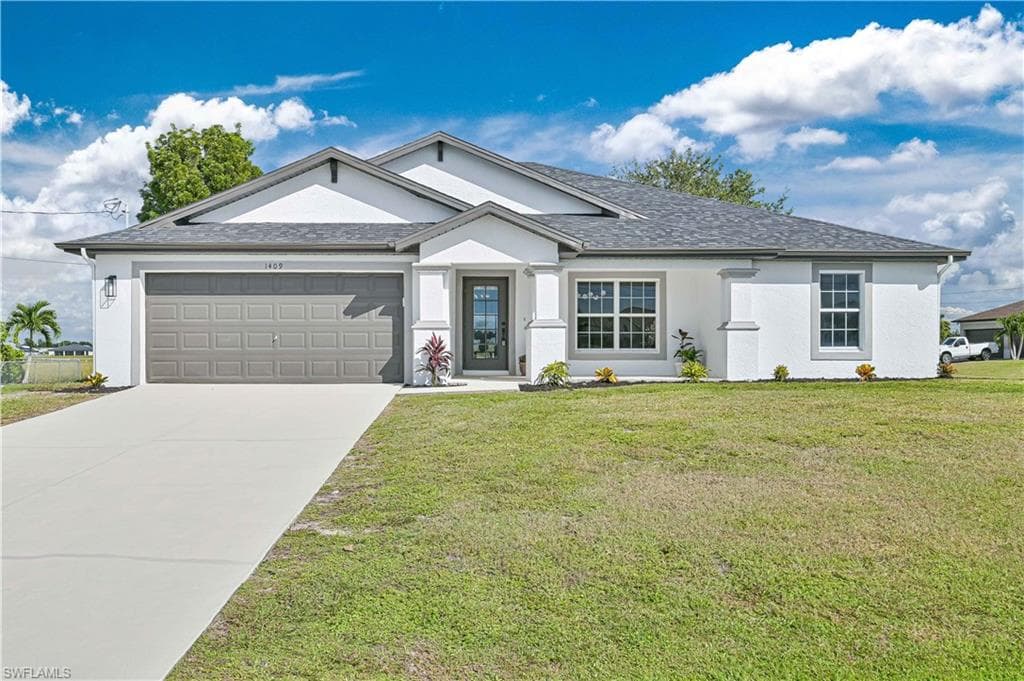 1409 NW 33rd AVE CAPE CORAL, FL 33993