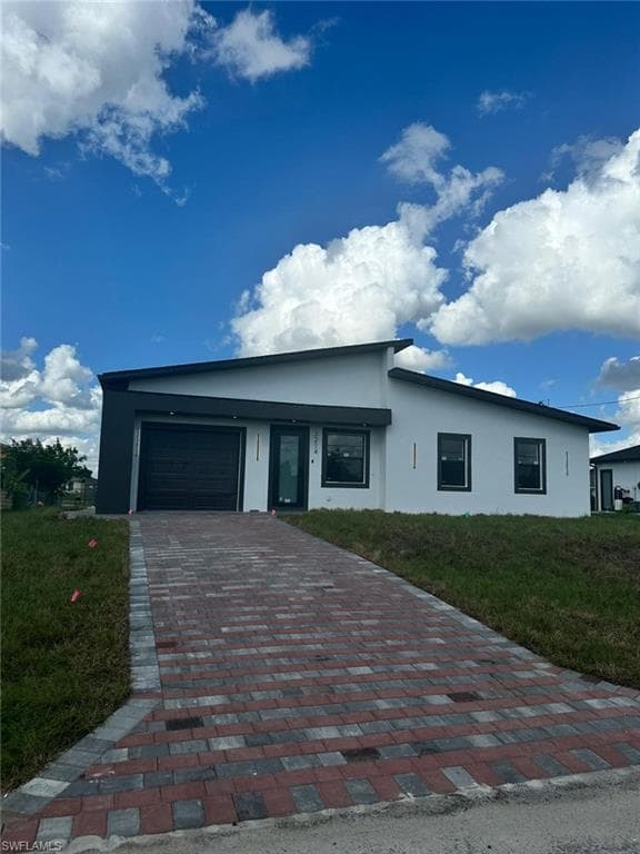 3214 12th ST SW LEHIGH ACRES, FL 33976