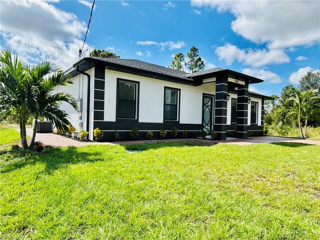 302 E 15th ST LEHIGH ACRES, FL 33972