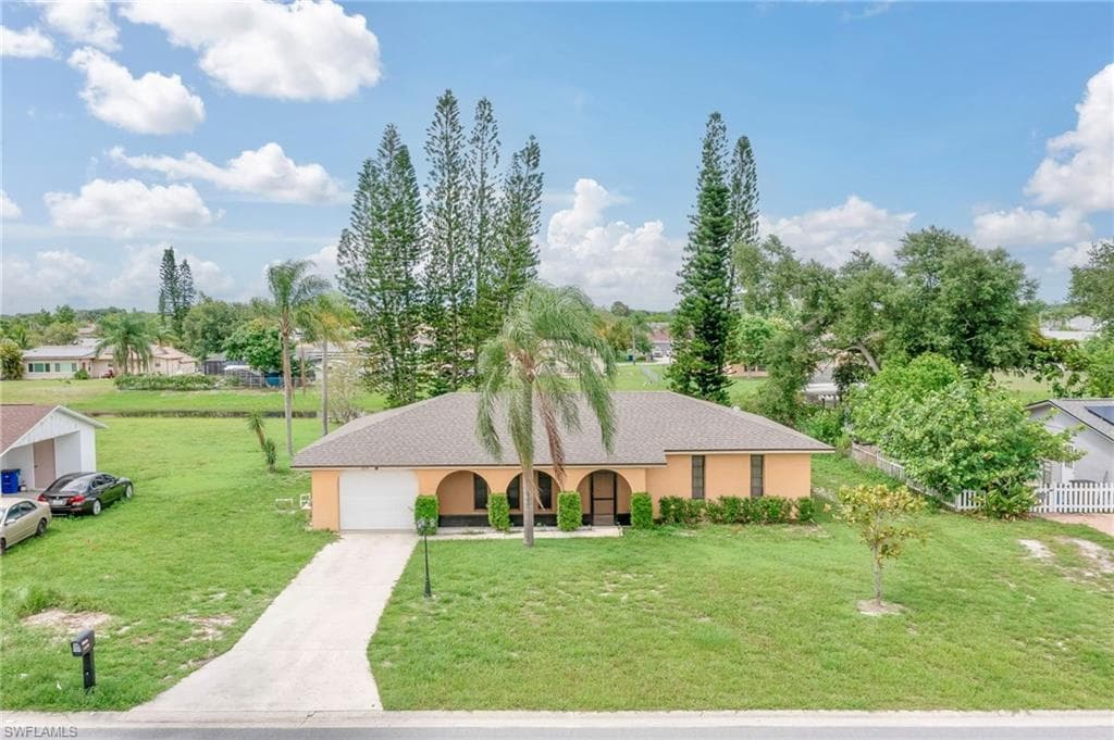 1438 CAYWOOD CIR N LEHIGH ACRES, FL 33936