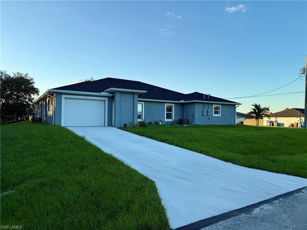 701-703 Gordon AVE S LEHIGH ACRES, FL 33973