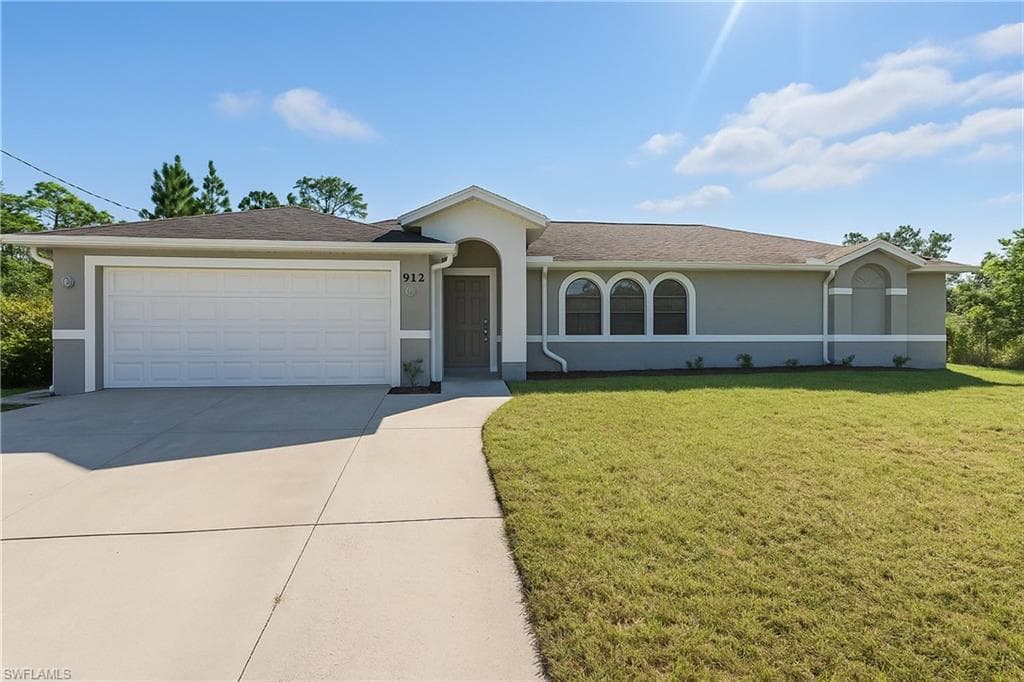 912 Lincoln AVE LEHIGH ACRES, FL 33972