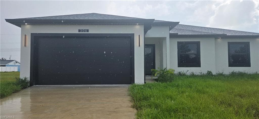 306 NE 10th TER CAPE CORAL, FL 33909