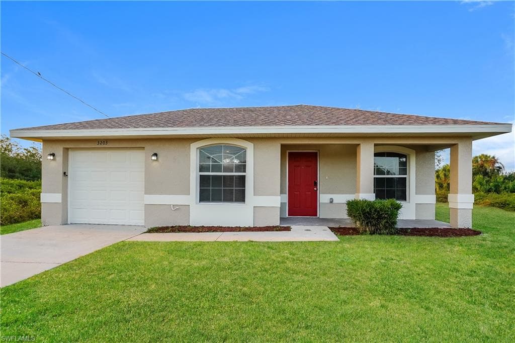 3203 34th ST SW LEHIGH ACRES, FL 33976