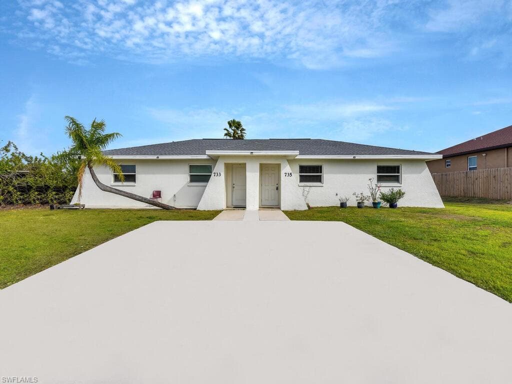 733/735 Gilbert AVE S LEHIGH ACRES, FL 33973