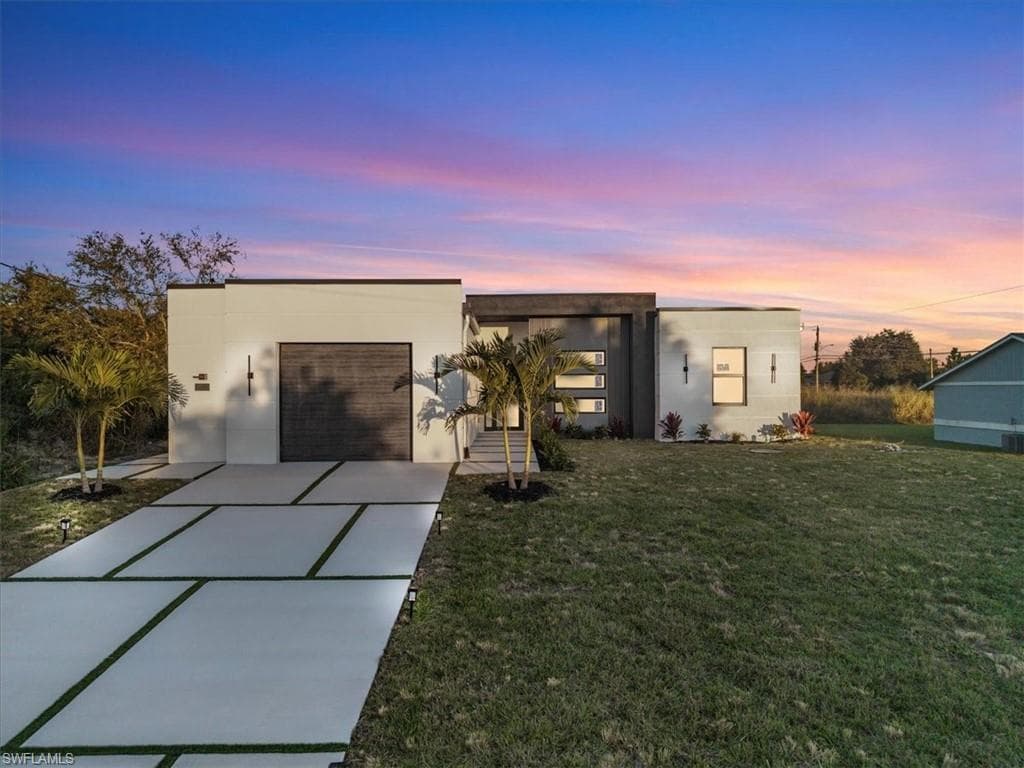 702 Irving AVE N LEHIGH ACRES, FL 33971