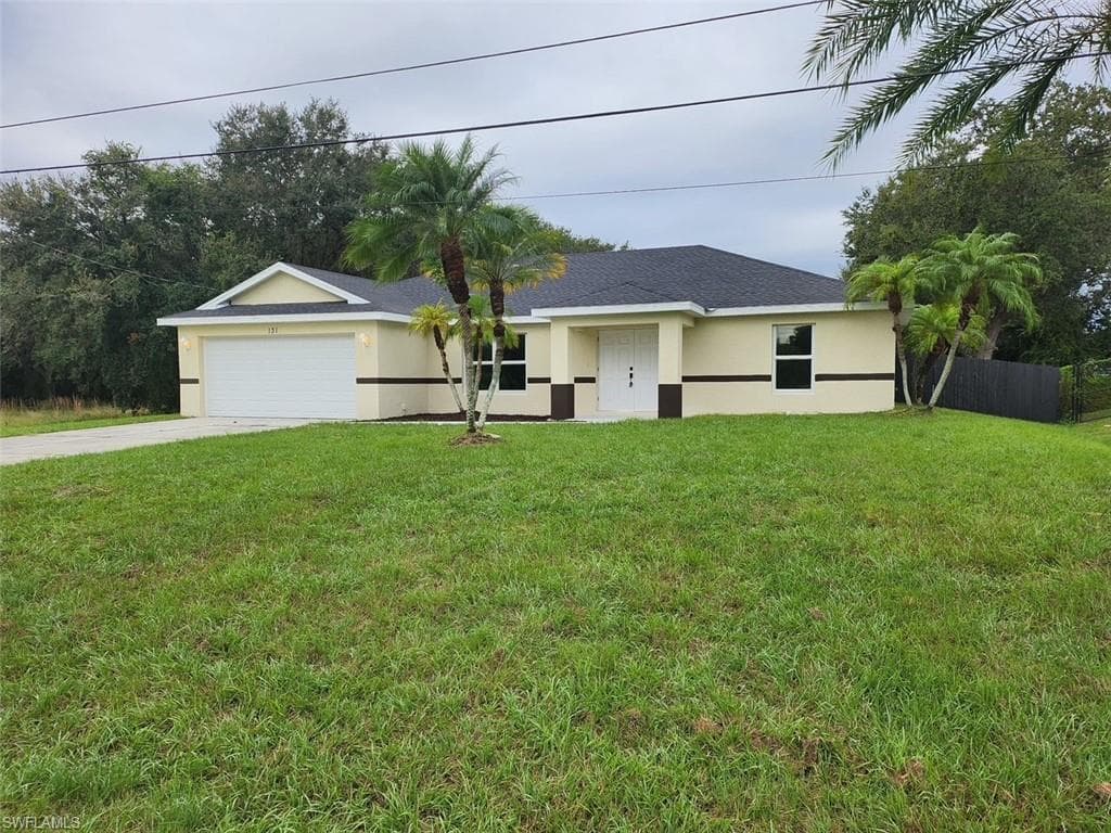 131 Grant BLVD LEHIGH ACRES, FL 33974