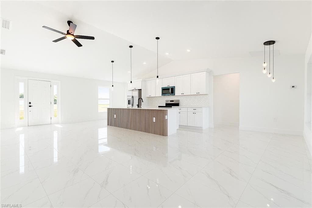 717 NW 19th TER CAPE CORAL, FL 33993