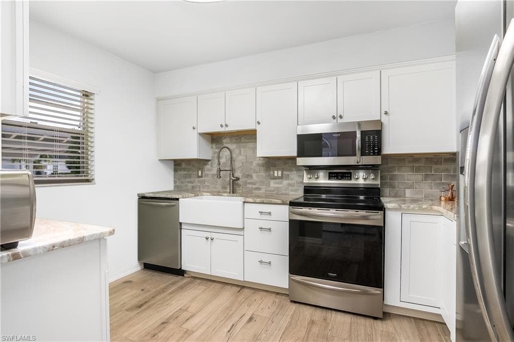 1348 Myerlee Gardens AVE FORT MYERS, FL 33919
