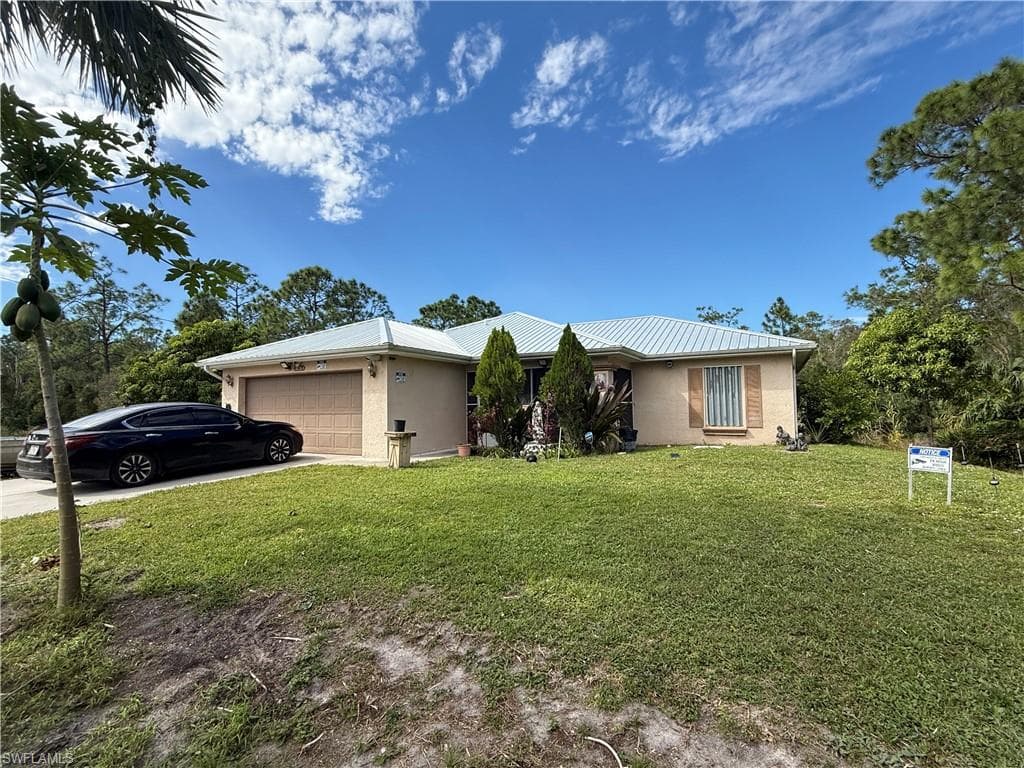447 Jaguar BLVD LEHIGH ACRES, FL 33974