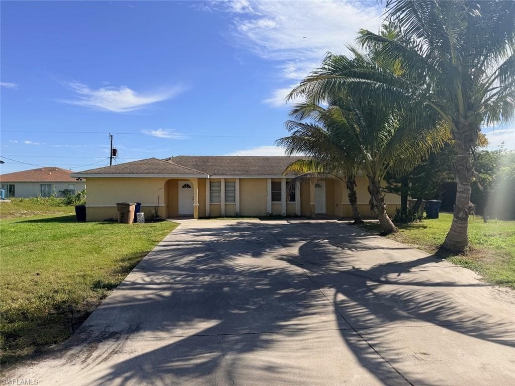 721 Gilbert AVE S LEHIGH ACRES, FL 33973