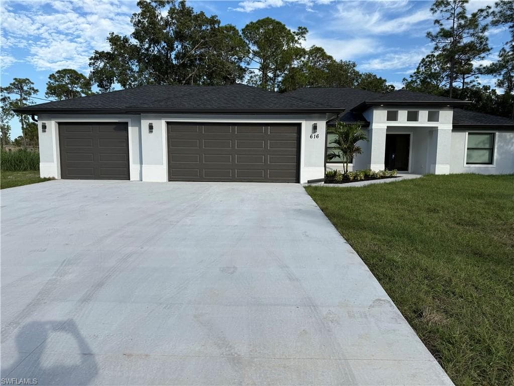 616 Plumosa AVE LEHIGH ACRES, FL 33972