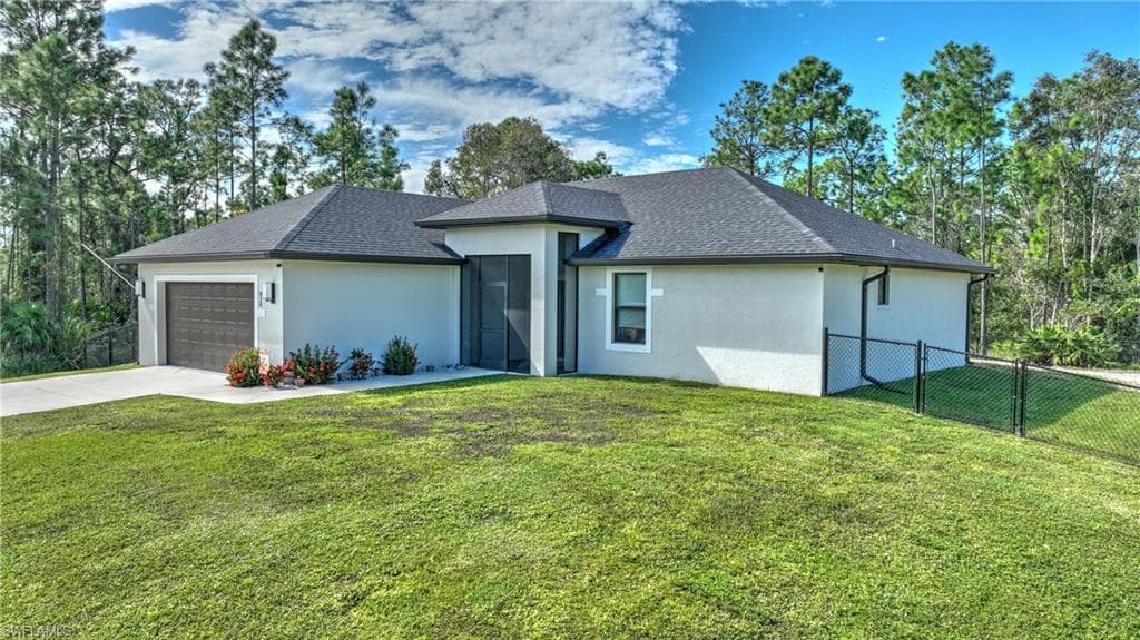 828 Downer AVE S LEHIGH ACRES, FL 33974