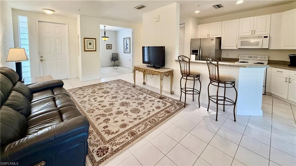 1335 Sweetwater CV 202 NAPLES, FL 34110