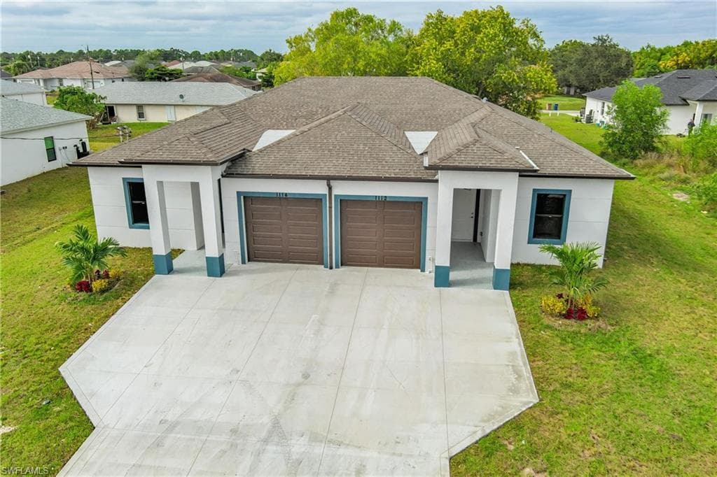 1112/1114 HAROLD AVE S LEHIGH ACRES, FL 33973