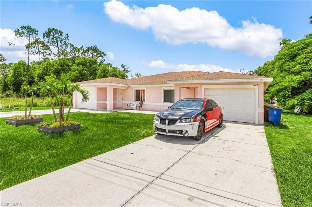 2412 Millie AVE S LEHIGH ACRES, FL 33973