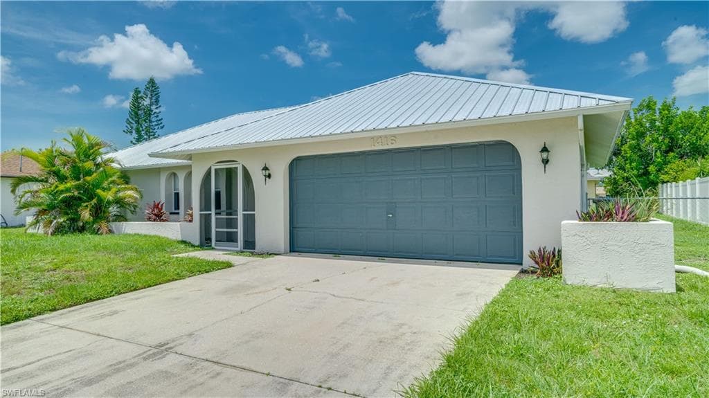 1416 SE 2nd AVE CAPE CORAL, FL 33990