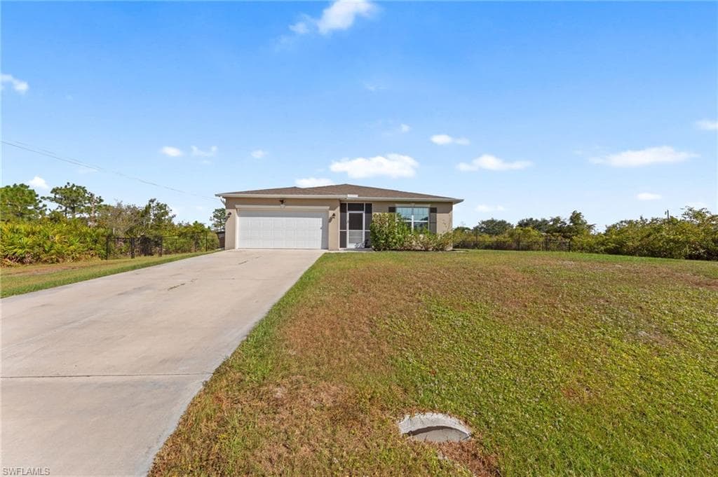 1306 Plumosa AVE LEHIGH ACRES, FL 33972