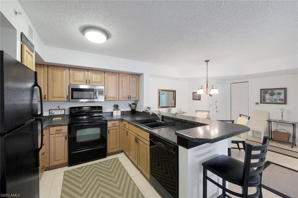 1275 Wildwood Lakes BLVD 103 NAPLES, FL 34104